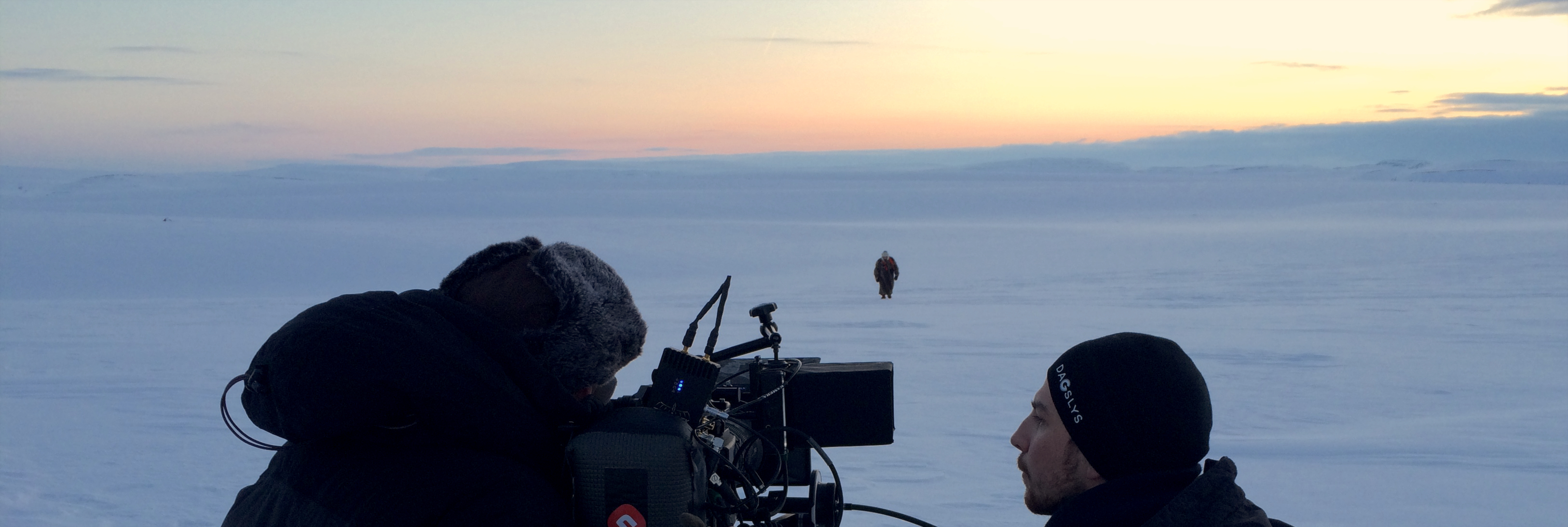 Robert Erstad filming in a snowy landscape